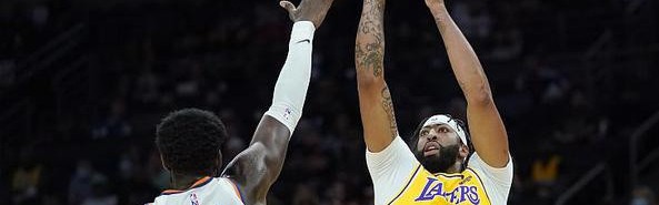  浓眉哥伤愈归来湖人双加时险胜掘金显韧性